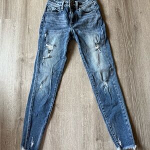Distressed Blue Denim Jeans